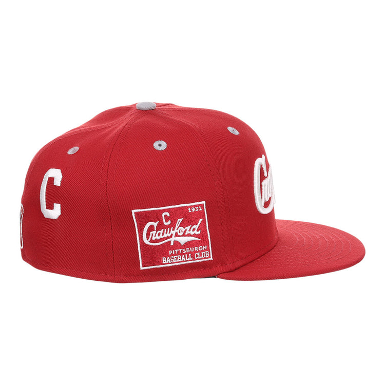 Ebbets Field Pittsburgh Crawfords NLB Varsity Fitted Ballcap: red with a flat brim, white side-embroidered “C,” Crawford Pittsburgh Baseball Club patch, and white top button.