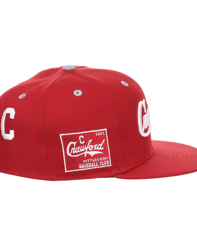 Ebbets Field Pittsburgh Crawfords NLB Varsity Fitted Ballcap: red with a flat brim, white side-embroidered “C,” Crawford Pittsburgh Baseball Club patch, and white top button.