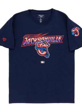 The Ebbets Field Jacksonville Jumbo Shrimp MiLB Fashion Cotton Short Sleeve Tee is navy blue with team logo and text on the chest, a shrimp logo on the left sleeve, and a small MLB logo near the hem.