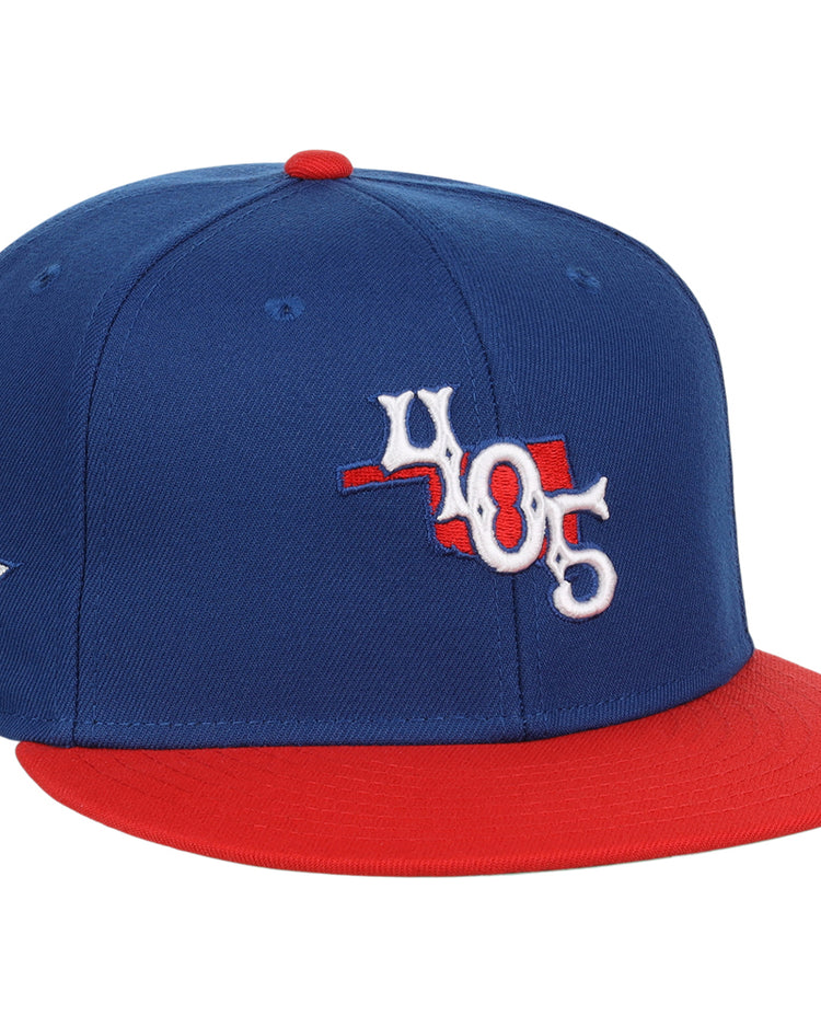 The Ebbets Field Oklahoma City Dodgers MiLB Two Tone Snapback Ballcap features blue and red colors, a 405 front logo, a red top button, and a white star with 