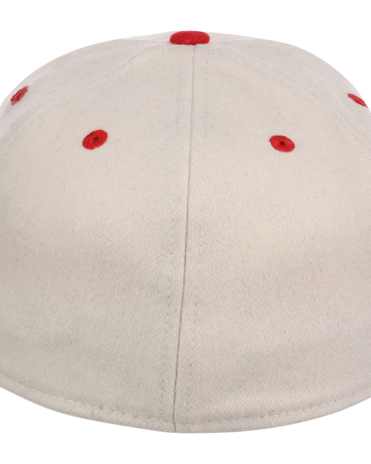 The Ebbets Field Kansas City Monarchs NLB Ballpark Fitted Ballcap is cream-colored, shown from the back with red stitched eyelets and a red top button.