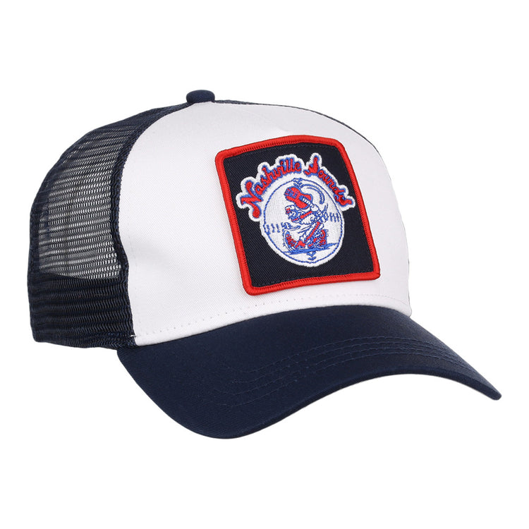 The Ebbets Field Nashville Sounds MiLB Square Patch Trucker Ballcap features a navy and white design with a black mesh back and a front patch showing 