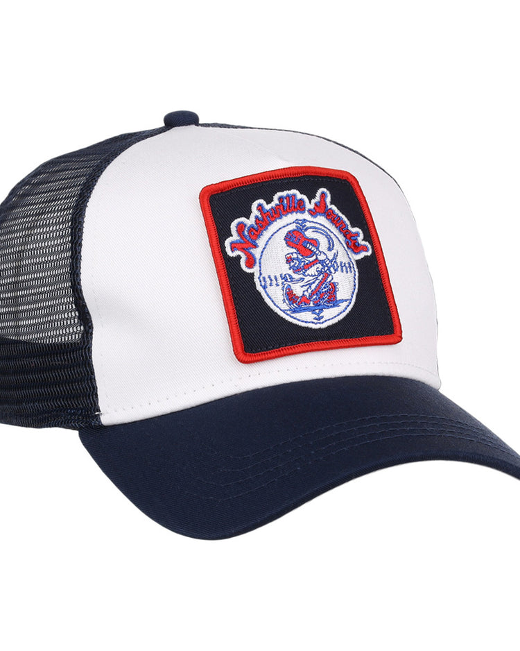The Ebbets Field Nashville Sounds MiLB Square Patch Trucker Ballcap features a navy and white design with a black mesh back and a front patch showing 