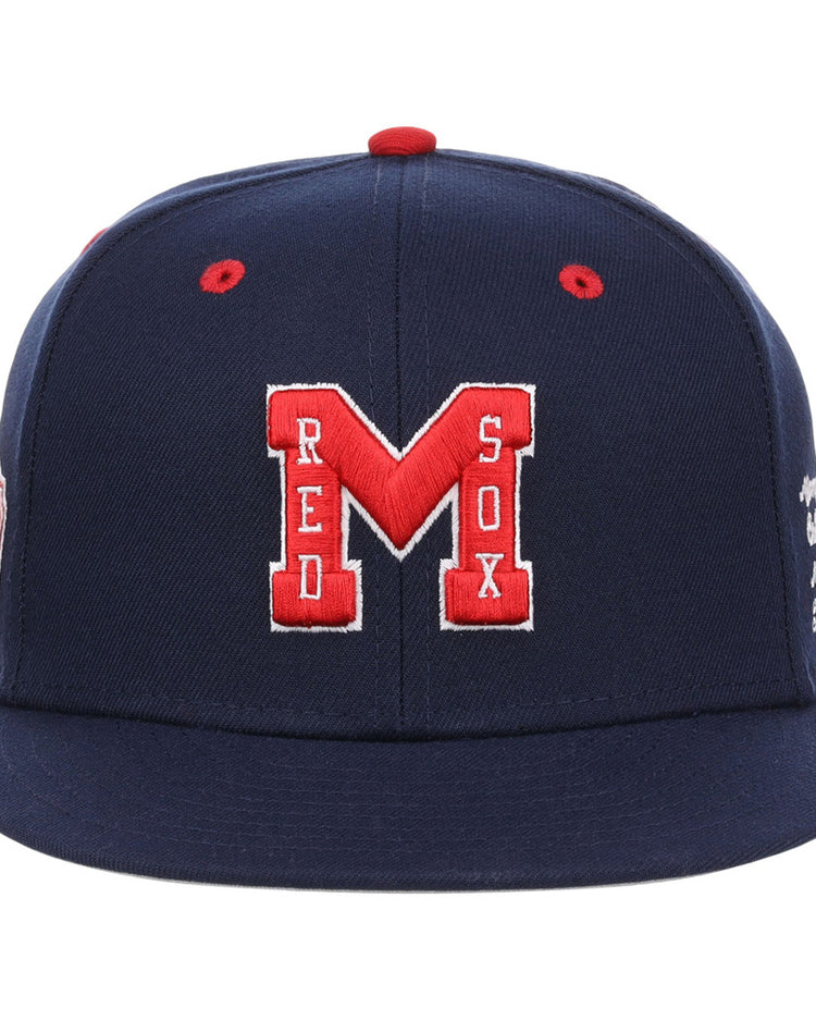 The Ebbets Field Memphis Red Sox NLB Varsity Fitted Ballcap is navy blue with red accents, featuring a red and white embroidered 