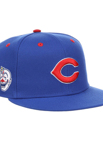 The Ebbets Field Indianapolis Clowns NLB Varsity Fitted Ballcap features a red “C” logo on the front, a clown face with baseball and “Browning” patch on the side, and red ventilation eyelets on the crown.