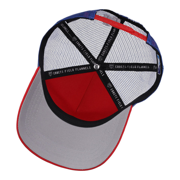 A top-down view of the Oklahoma City 89Ers MiLB Trucker Ballcap by Ebbets Field, featuring blue and red mesh, black sweatbands with 