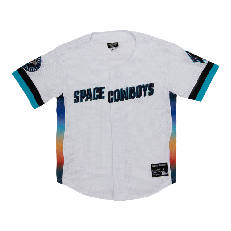 The Ebbets Field Sugarland Space Cowboys MiLB Button Down Jersey features a white base, bold blue front lettering, multicolor gradient bottom, teal and black sleeve accents, and patches on both sleeves.
