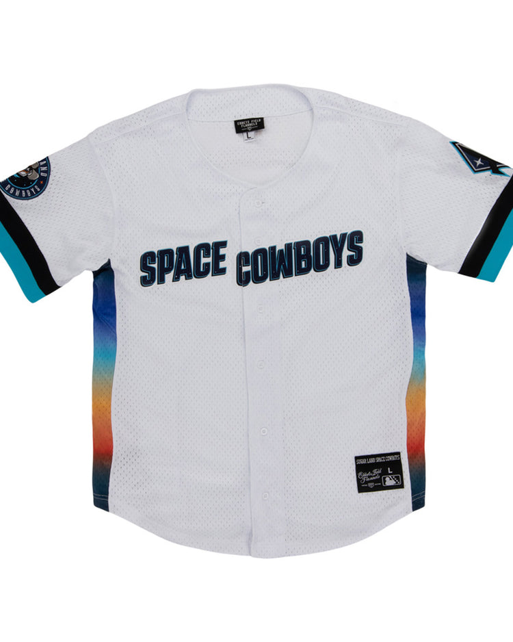 The Ebbets Field Sugarland Space Cowboys MiLB Button Down Jersey features a white base, bold blue front lettering, multicolor gradient bottom, teal and black sleeve accents, and patches on both sleeves.