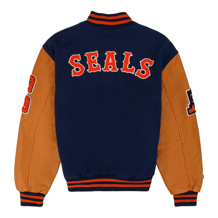The Ebbets Field San Francisco Seals MiLB Dna Varsity Jacket features a navy back, tan sleeves with orange 19/29 patches, 