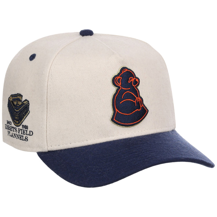 The San Francisco Sea Lions NLB Ballpark A-Frame Ballcap by Ebbets Field features a beige crown, navy brim, dark blue top button, an outlined bear logo on the front, and stadium embroidery with text on the side.