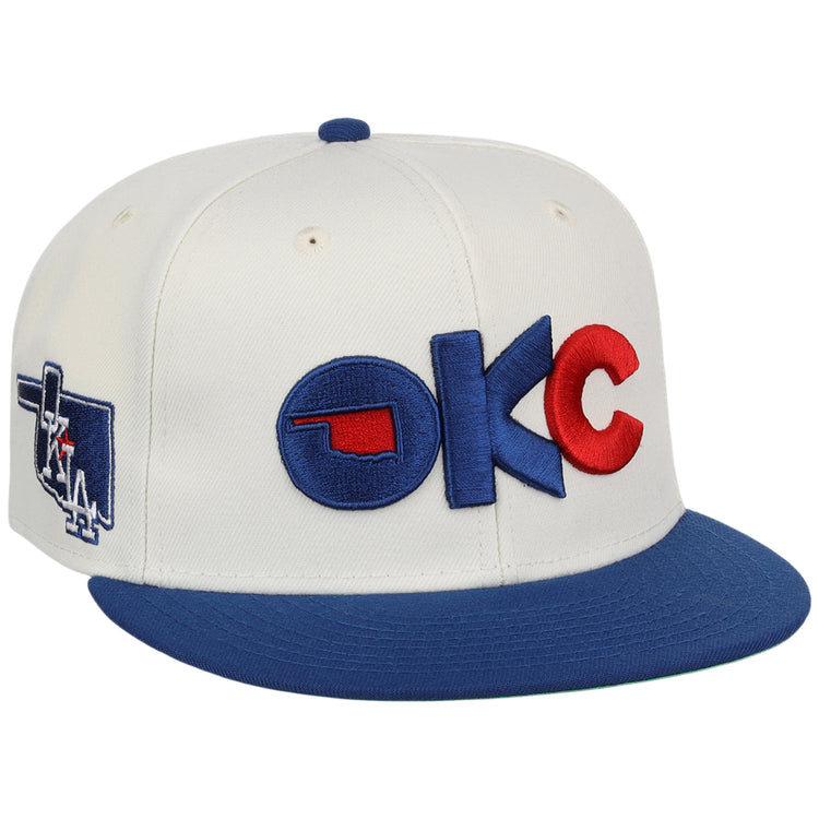 The Oklahoma City Dodgers MiLB Snapback Ballcap by Ebbets Field is a white cap with a blue brim, 
