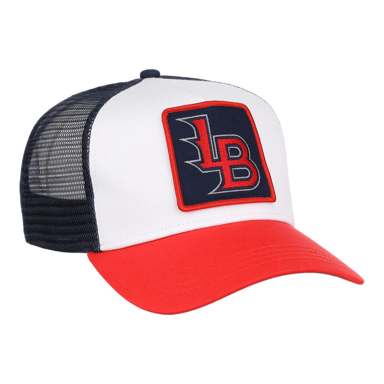 The Ebbets Field Louisville Bats MiLB Trucker Ballcap features a white front, black mesh back, red bill, and a square “LB” patch in red and white on a navy background.