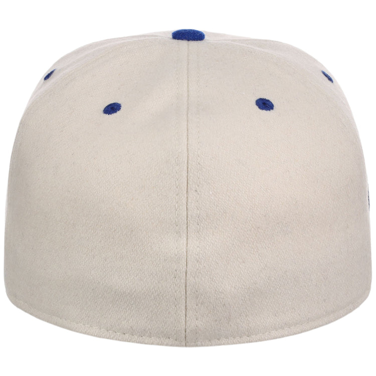 The Ebbets Field Brooklyn Royal Giants NLB Ballpark Fitted Ballcap is a beige cap seen from the back, with blue eyelets and a blue top button.