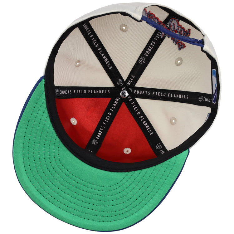 Inside view of the Oklahoma City Dodgers MiLB Snapback Ballcap by Ebbets Field, showing black branded lining, red and white interior panels, white stitched eyelets, and a green underbrim.