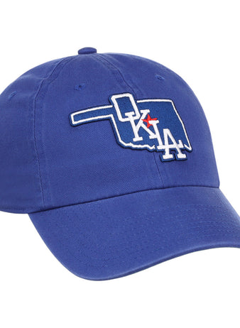 The Ebbets Field Oklahoma City Dodgers MiLB Dad Ballcap is a blue cap featuring an outline of Oklahoma with 