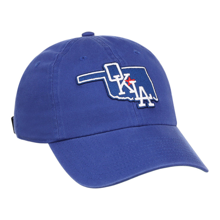 The Ebbets Field Oklahoma City Dodgers MiLB Dad Ballcap is a blue cap featuring an outline of Oklahoma with 