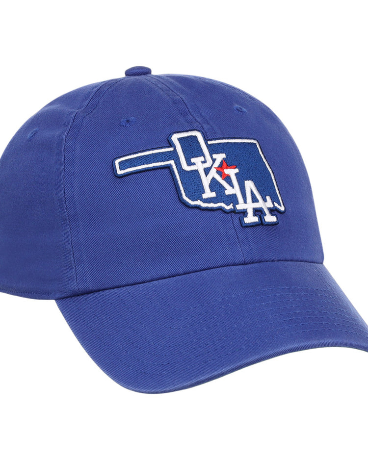 The Ebbets Field Oklahoma City Dodgers MiLB Dad Ballcap is a blue cap featuring an outline of Oklahoma with 