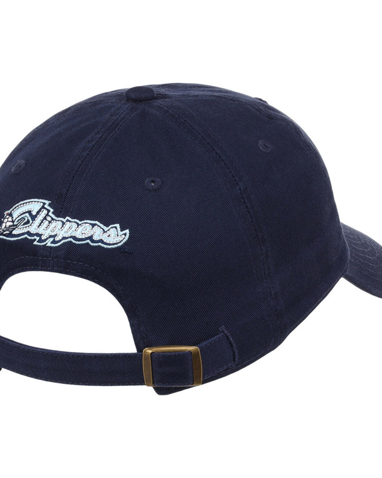 The Ebbets Field Columbus Clippers MiLB Dad Ballcap is a navy baseball cap featuring an adjustable strap with brass buckle and 