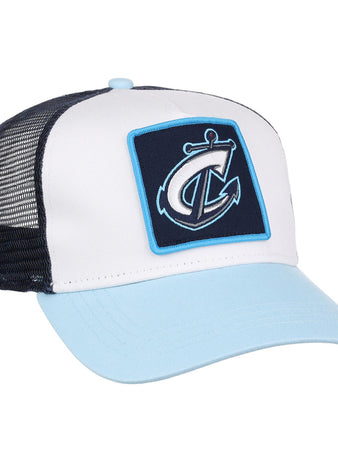 The Ebbets Field Columbus Clippers MiLB Trucker Ballcap features a light blue brim, white front panel, black mesh back, and a patch with a stylized anchor and letter C on the front.