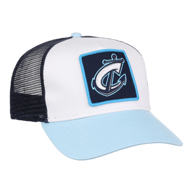 The Ebbets Field Columbus Clippers MiLB Trucker Ballcap features a light blue brim, white front panel, black mesh back, and a patch with a stylized anchor and letter C on the front.