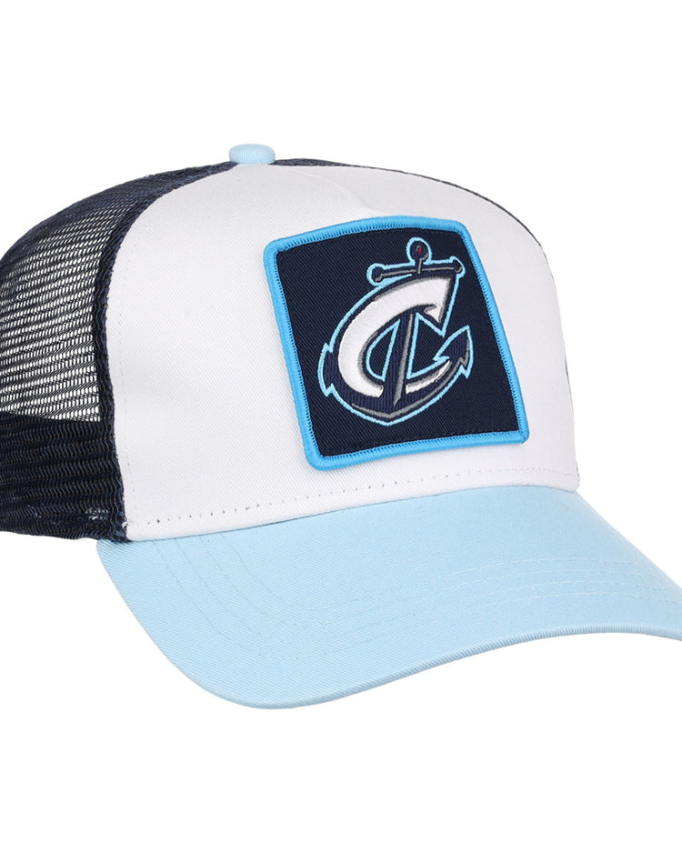 The Ebbets Field Columbus Clippers MiLB Trucker Ballcap features a light blue brim, white front panel, black mesh back, and a patch with a stylized anchor and letter C on the front.