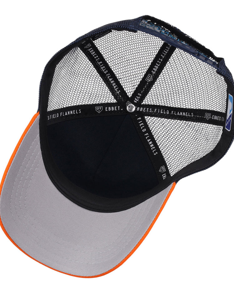 A top-down view of the Ebbets Field Sugarland Space Cowboys MiLB Trucker Ballcap shows a gray brim, orange edge, black mesh back, and interior black bands labeled 