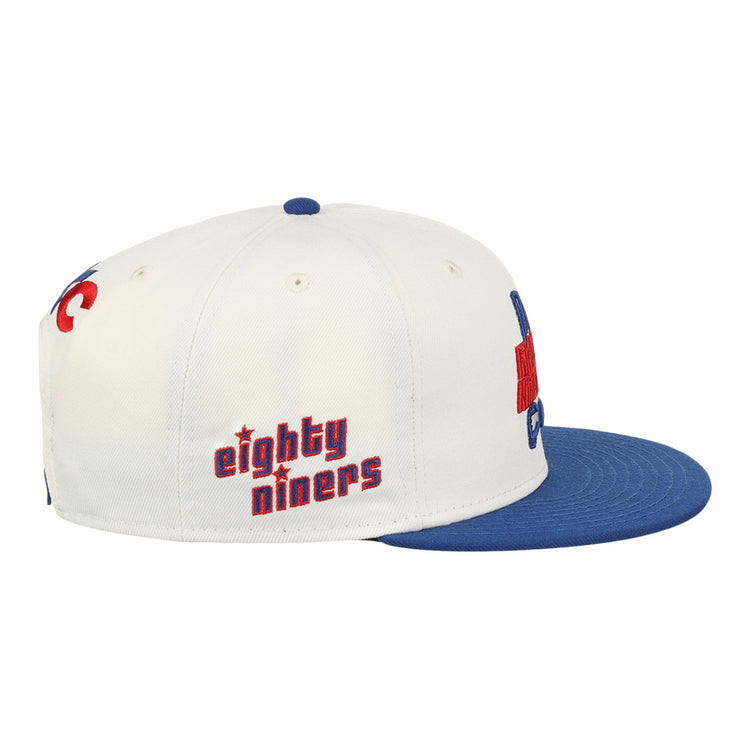 The Ebbets Field Oklahoma City 89Ers MiLB Logo Wordmark Snapback Ballcap is a white cap with a blue flat brim and 