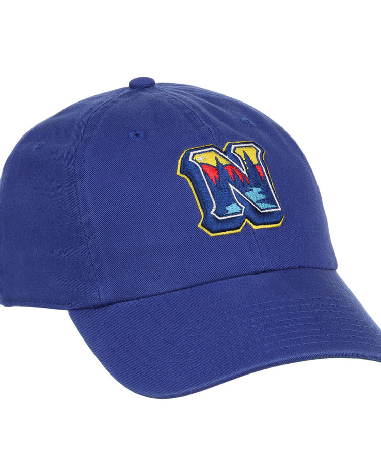 The Ebbets Field Northwest Arkansas Naturals MiLB Dad Ballcap is a blue hat with a colorful, stylized letter N embroidered on the front.