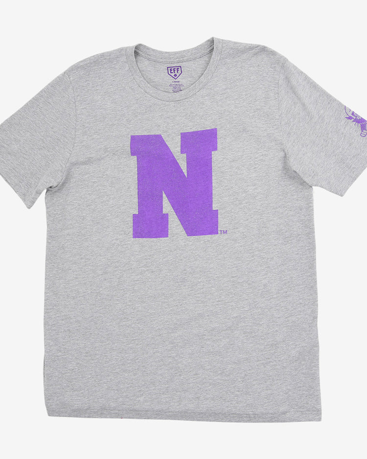 The Ebbets Field Northwestern University Short Sleeve Tee is light gray with a bold purple 