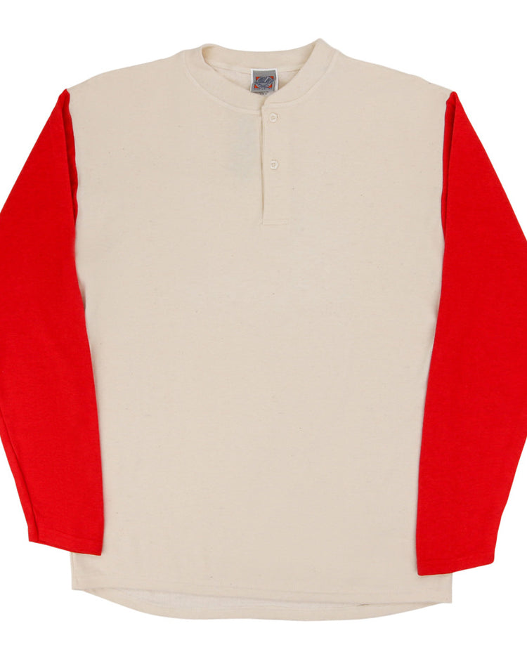 The Ebbets Field Fungo Shirt - Red Long Sleeves features a cream body, bold red sleeves, and a short button placket at the neck. The shirt is displayed flat on a white background.