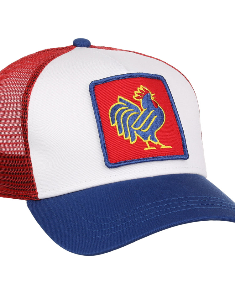 The Ebbets Field Northwest Arkansas Naturals MiLB Trucker Ballcap features a blue brim, white front panel, red mesh back, and a patch with a stylized blue, yellow, and red rooster on a red background.
