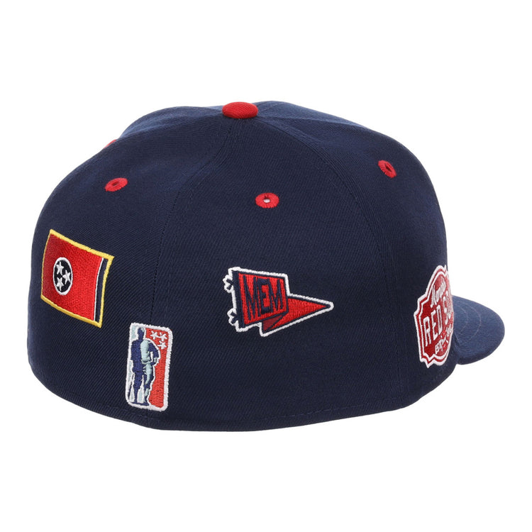 The Ebbets Field Memphis Red Sox NLB Varsity Fitted Ballcap is a navy blue cap with red button and eyelets, featuring patches of the Tennessee flag, MEM pennant, silhouetted figure, and REBEL badge on the back and side.