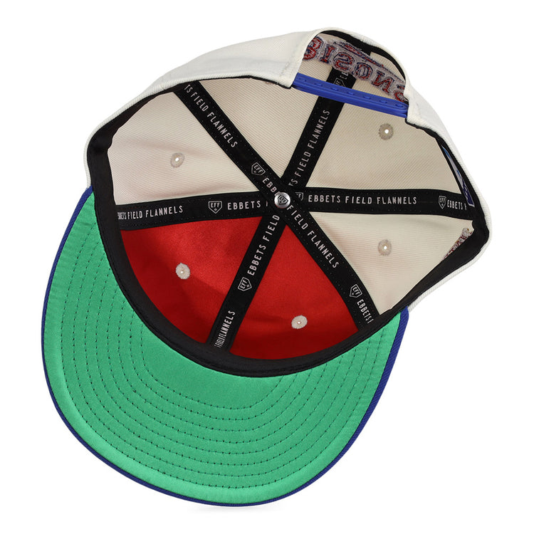 The inside of the Ebbets Field Buffalo Bisons MiLB Snapback Ballcap has a green underbill, red crown, black sweatband, white panels, and black fabric covering the inner seams labeled 