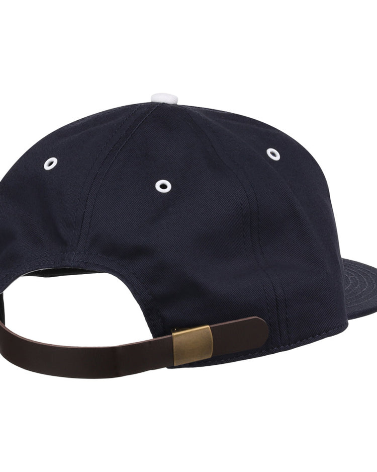 The Ebbets Field Binghamton Triplets MiLB Cotton Ballcap is navy blue, shown from the back with a brown adjustable strap, brass clasp, and white ventilation eyelets.