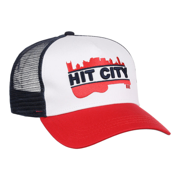 The Ebbets Field Nashville Sounds MiLB Logo Wordmark Trucker Ballcap features a white front, red brim, black mesh back, and a bold red guitar with city skyline and 