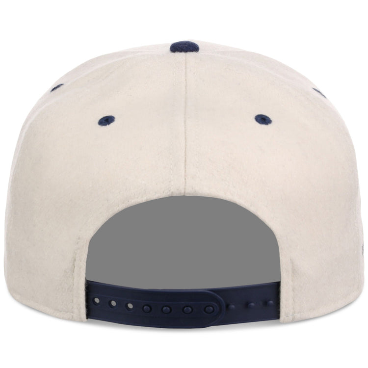 The Ebbets Field Homestead Grays NLB Ballpark A-Frame Ballcap is beige, shown from the back with a dark blue adjustable snapback strap and blue ventilation eyelets.