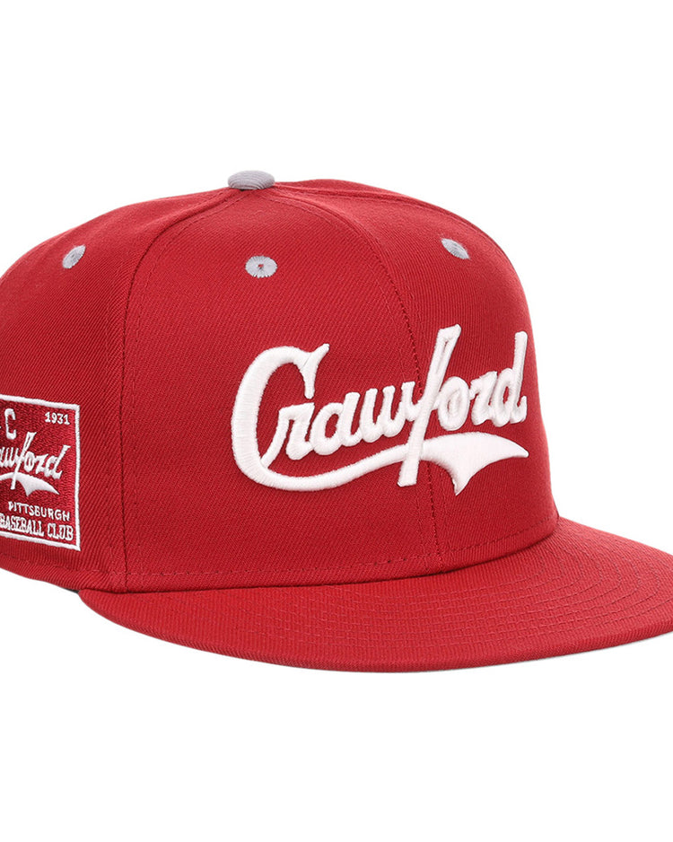 The Ebbets Field Pittsburgh Crawfords NLB Varsity Fitted Ballcap is a red cap featuring 