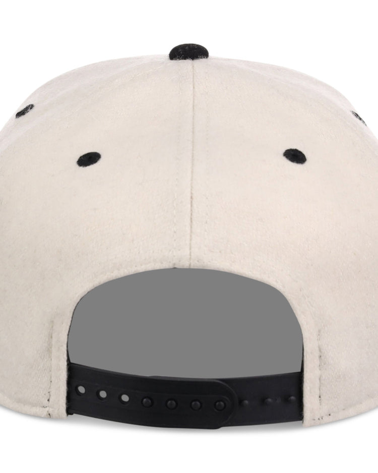 The Ebbets Field New York Black Yankees NLB Ballpark A-Frame Ballcap is beige, seen from the back with a black adjustable strap and black ventilation eyelets on the crown.