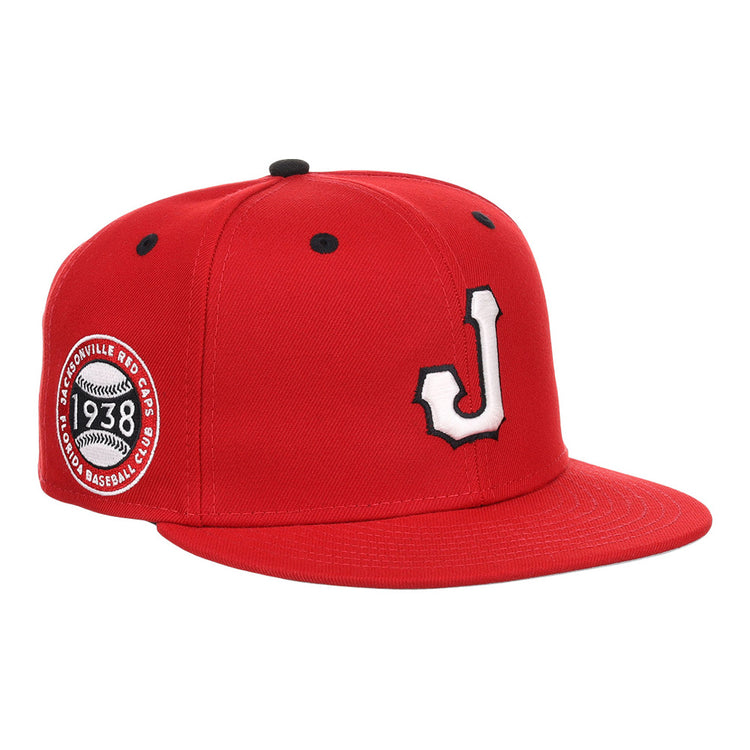 The Ebbets Field Jacksonville Red Caps NLB Varsity Fitted Ballcap features a red design, a white and black 