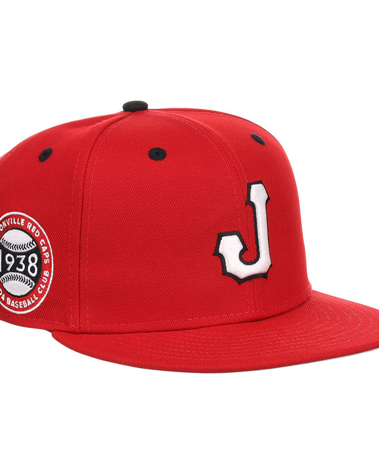 The Ebbets Field Jacksonville Red Caps NLB Varsity Fitted Ballcap features a red design, a white and black 