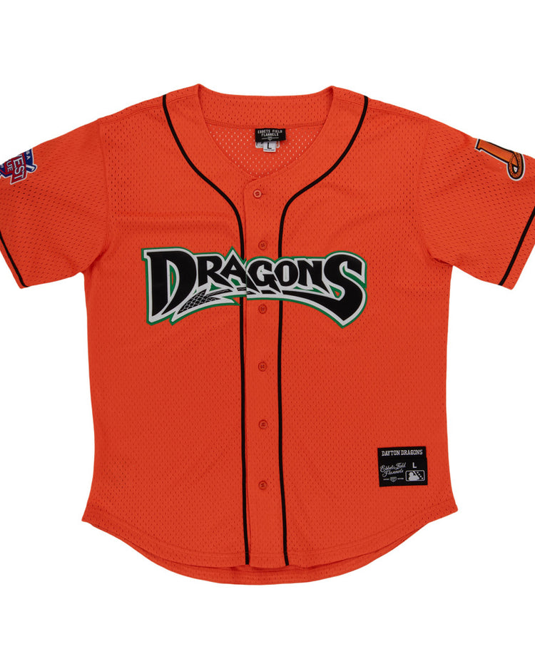 The Ebbets Field Dayton Dragons MiLB Button Down Jersey features a bright orange body with black trim, 