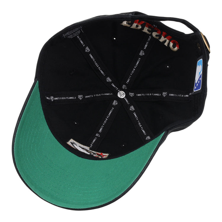 The underside of the Fresno Grizzlies MiLB Dad Ballcap by Ebbets Field features a green brim, visible inner stitching, branded black fabric tape with white logos and text, tags, labels, and a small patch sewn near the back.