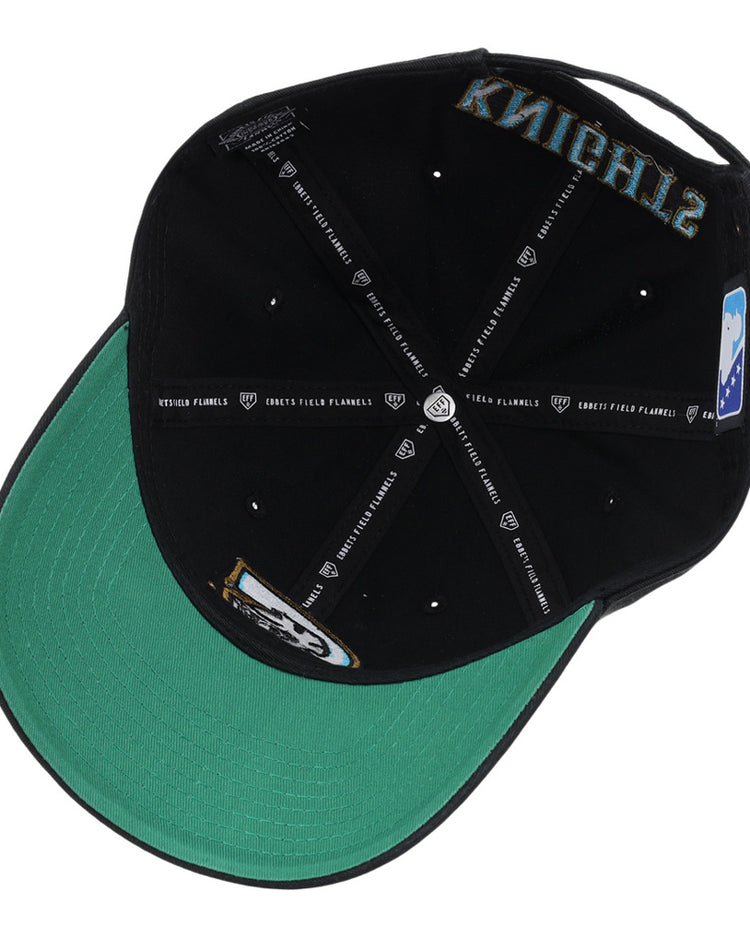 A black Charlotte Knights MiLB Dad Ballcap by Ebbets Field shown from underneath, with a green brim, visible stitching, interior logos, and 