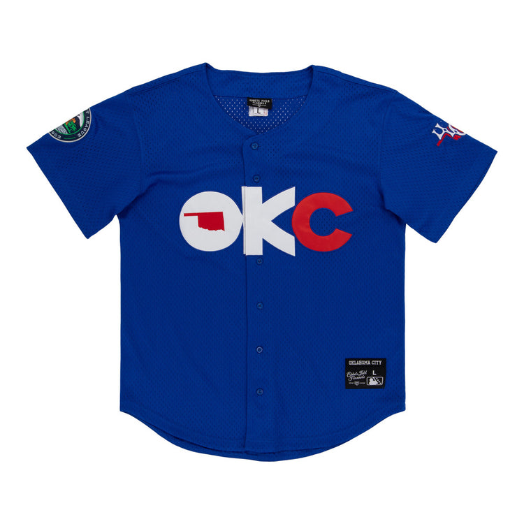 The Ebbets Field Oklahoma City 89Ers MiLB Button Down Jersey is a blue short-sleeve baseball jersey with 
