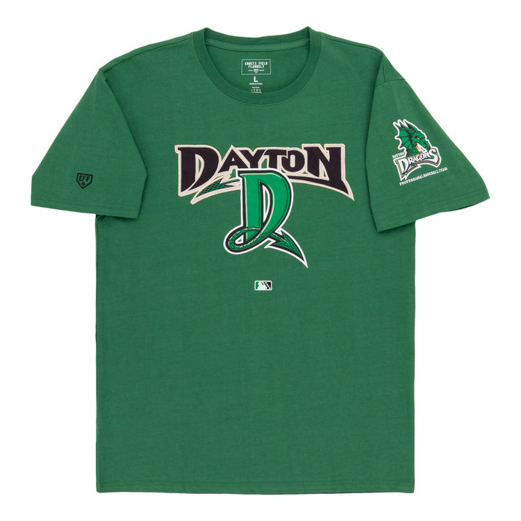 Dayton Dragons MiLB Fashion Cotton Short Sleeve Tee by Ebbets Field features “Dayton” and a stylized D logo on the front, a dragon head with “Dayton Dragons” text on the left sleeve, athletic design, and brand tag at the collar.