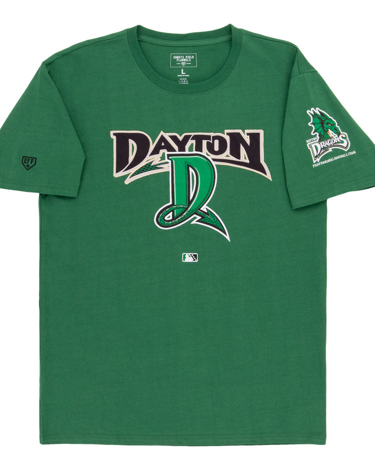 Dayton Dragons MiLB Fashion Cotton Short Sleeve Tee by Ebbets Field features “Dayton” and a stylized D logo on the front, a dragon head with “Dayton Dragons” text on the left sleeve, athletic design, and brand tag at the collar.