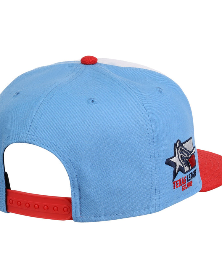 The Ebbets Field Corpus Christi Hooks MiLB Snapback Ballcap features light blue fabric, a red brim and button, adjustable snapback closure, and a Texas League star-and-glove logo on the side.