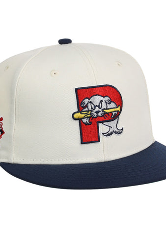 The Ebbets Field Portland Sea Dogs MiLB Snapback Ballcap is white with a navy blue brim, a red 