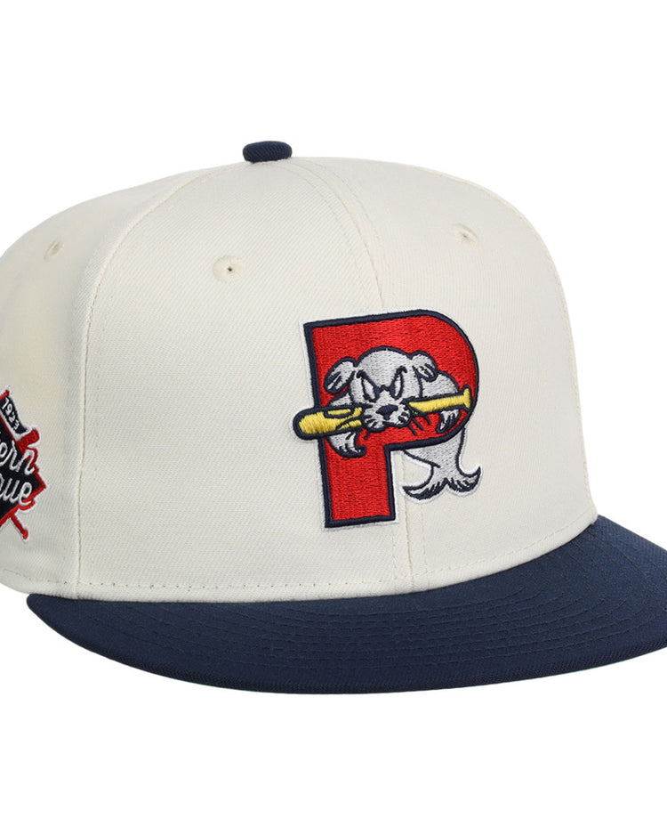 The Ebbets Field Portland Sea Dogs MiLB Snapback Ballcap is white with a navy blue brim, a red 