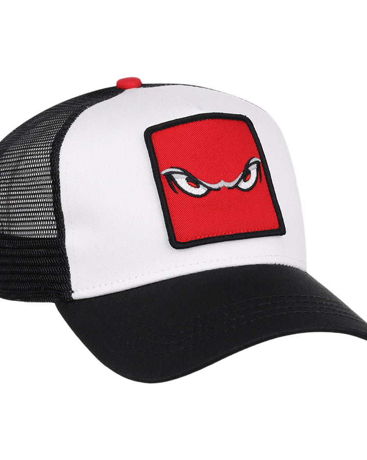 The Ebbets Field Lake Elsinore Storm MiLB Trucker Ballcap features a white front, black mesh back, and black curved brim with a red square patch displaying stylized, angry eyes embroidered on the front.